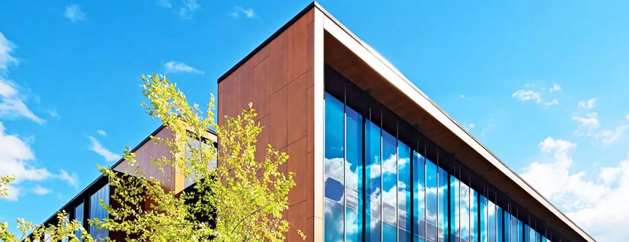 Exterior of UTM building against blue sky