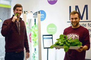 students with vertical farmwall