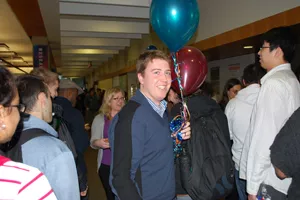 Image of library staff with balloons