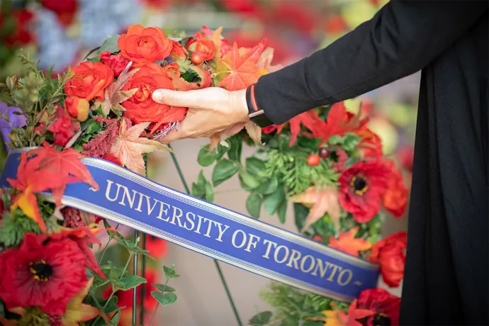 Wreath with ribbon that reads University of Toronto