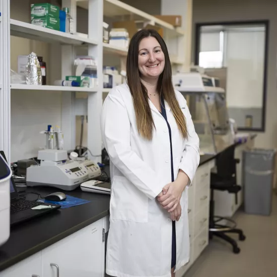 Nicole Novroski stands in her lab