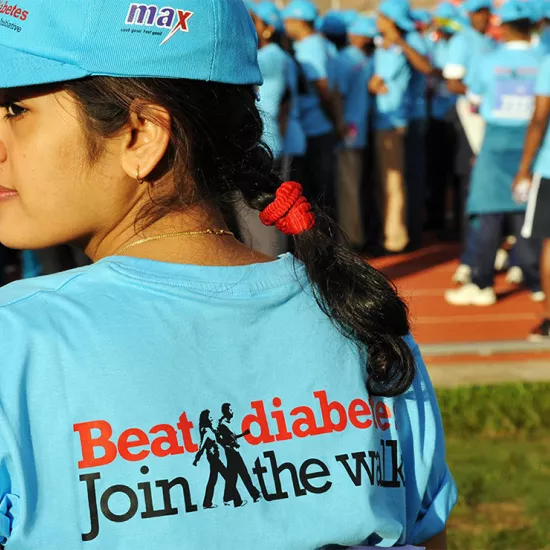Woman wearing t-shirt that reads Beat Diabetes, Join the walk
