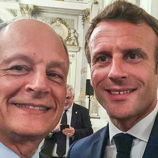 U of T President Meric Gertler snaps a selfie with French President Emmanuel Macron