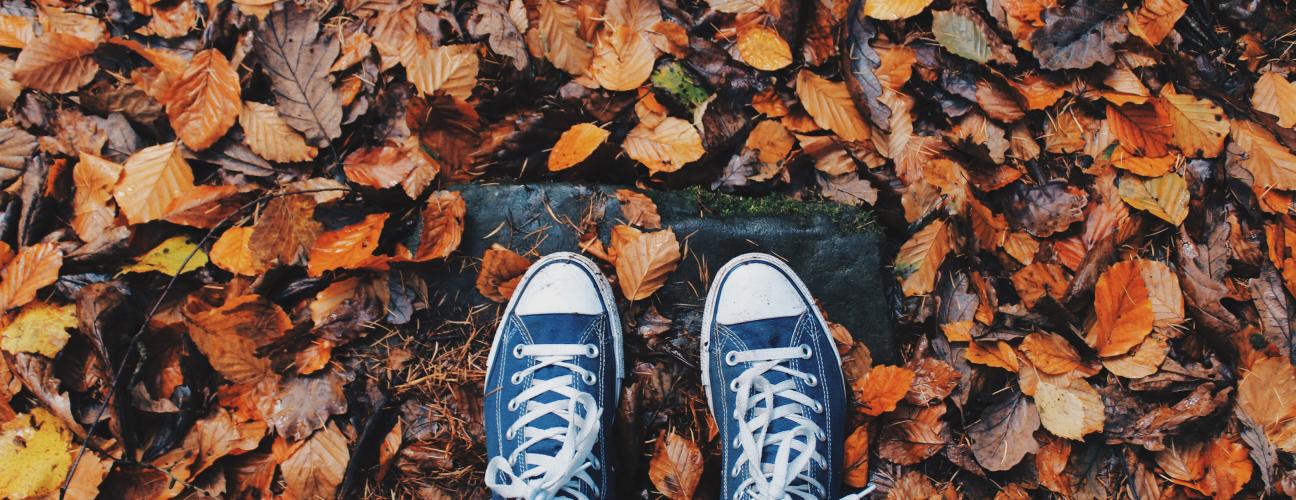 Feet in fall leaves