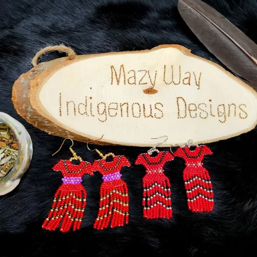 wooden sign reads "Mazy Way Indigenous Designs" and features 4 earrings using Indigenous beading techniques