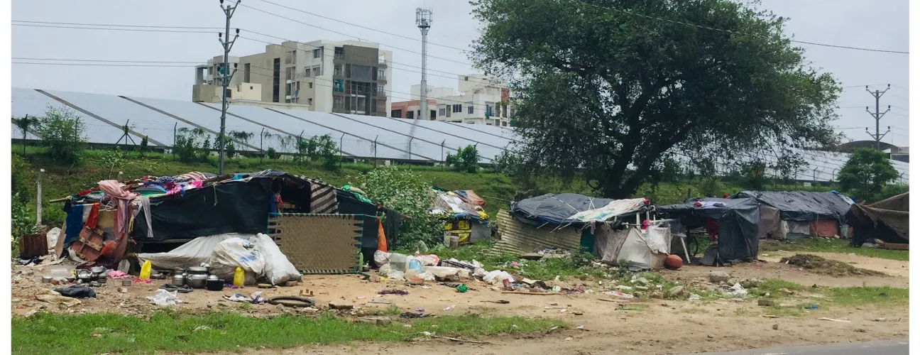 makeshift houses on the side of the road