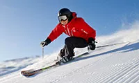 Skiier going downhill