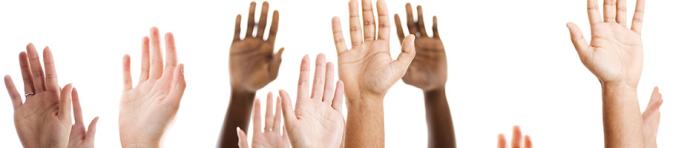 Hands raised against a white background