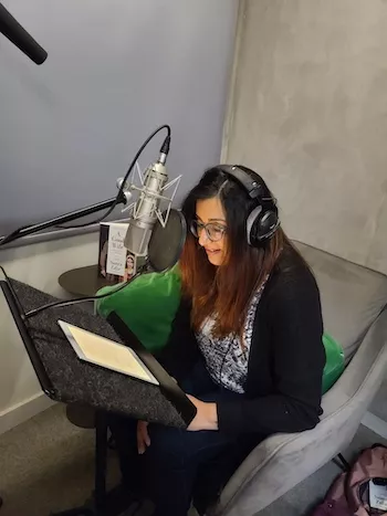 Samra Zafar recording the audiobook version of her memoir 'A Good Wife,' which she reads herself