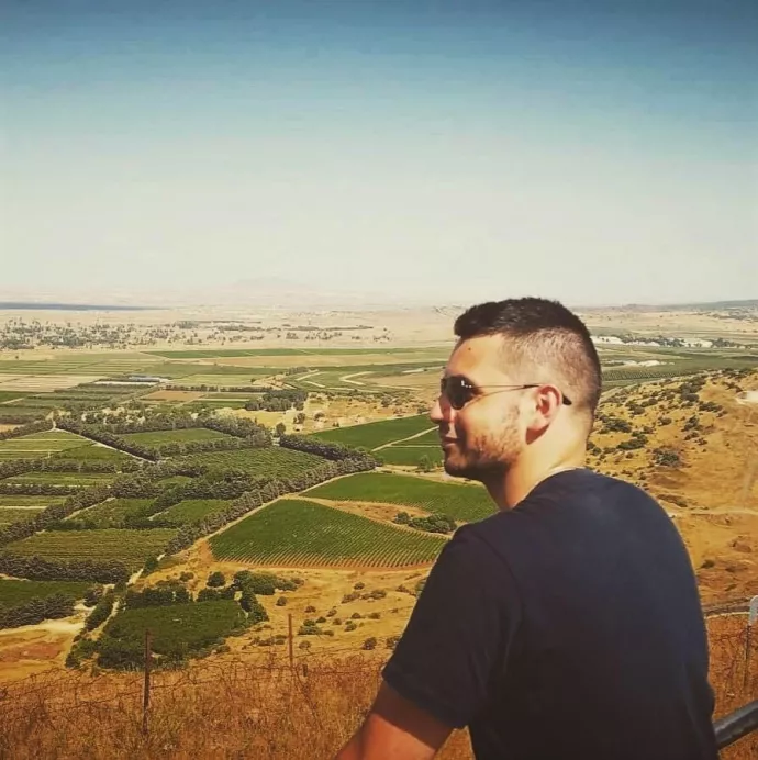 David Harary overlooking the Israeli/Syrian border into the Syrian town of Quneitra