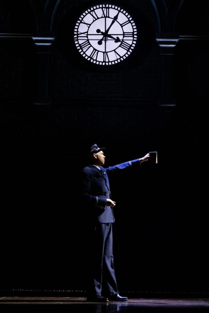 Mark Crawford as the Station Master in Harry Potter and the Cursed Child Toronto. Photo by Evan Zimmerman.