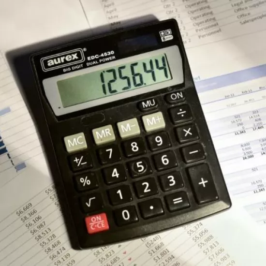 Calculator on top of financial spreadsheets