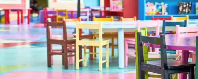 kindergarten classroom with colourful furniture, floors and books