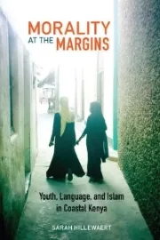 book cover showing two figures wearing hijabs walking between buildings