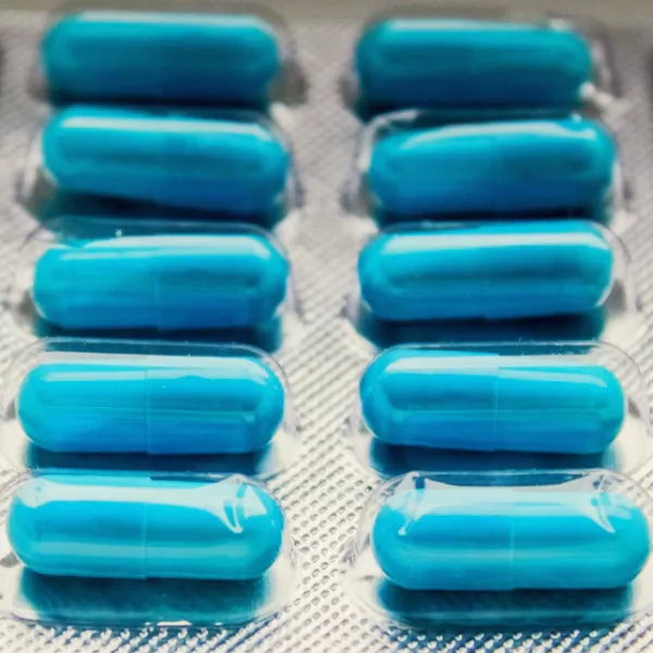 Blue pills in a package