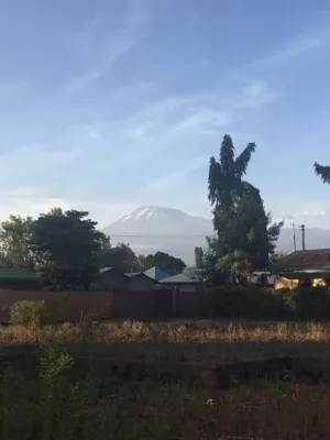 Mount Kilimanjaro in the distance as viewed from Moshi.
