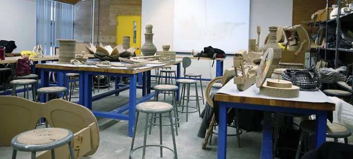 studio with sculptures on the tabletops