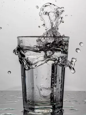 Water displaced from drinking glass