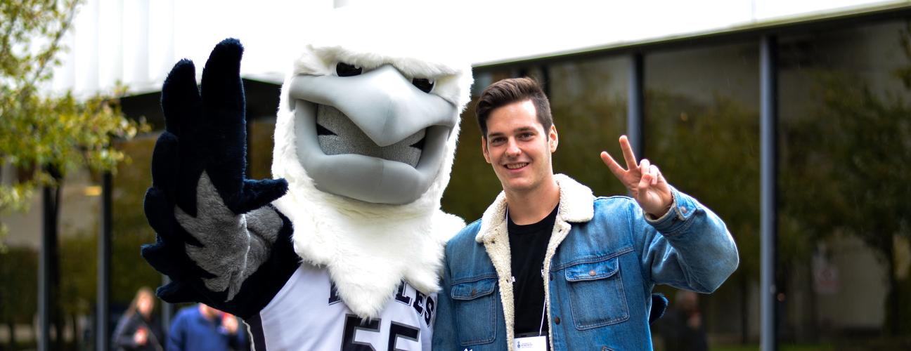Student with UTM Eagle
