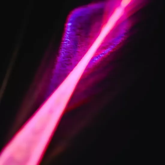A bright pink laser