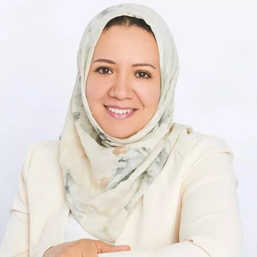 Prof. Sarah El Cherki's headshot featured in the Medium with the news article