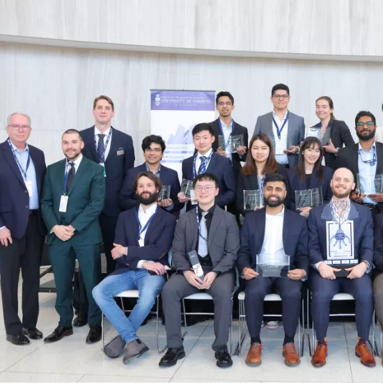 group of artificial intelligence competitors standing in a group