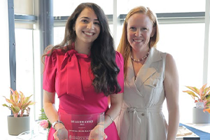 Anureet Kaur with her IMI Award presented by Claire Westgate