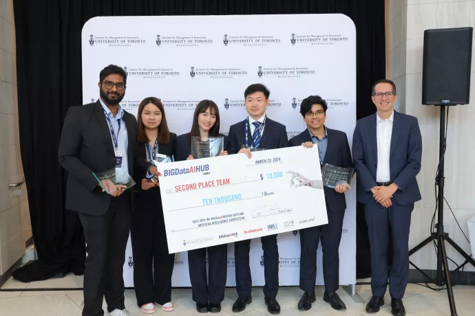 group of people winning second place in artificial intelligence competition with oversized cheque