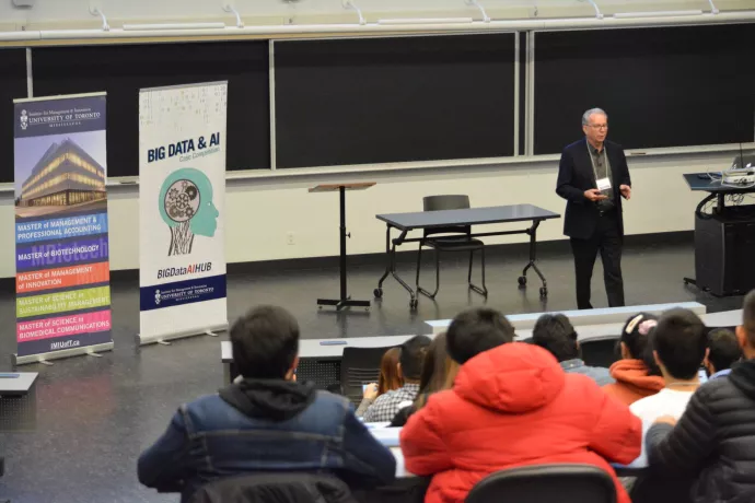 Prof. Kevin Yousie welcomes students to competition 