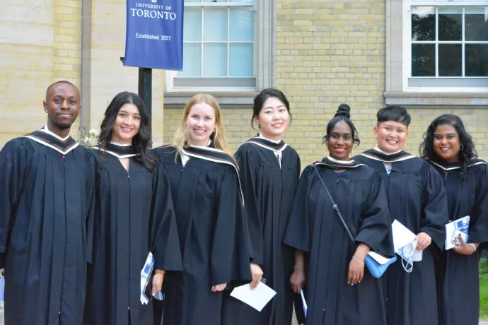 Seven of the students from the graduating MUI inaugural class outside Convocation Hall on June 3, 2022