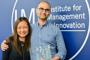 Nico Lacetera with his IMI award presented by Soo Min Toh