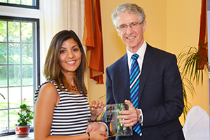 Natasha Walli with her IMI award presented by Hugh Gunz