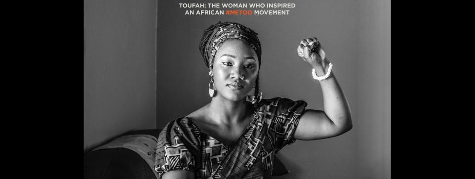 TOUFAH: THE WOMAN WHO INSPIRED AN AFRICAN #METOO MOVEMENT | Toufah Jallow raises a fist in the air