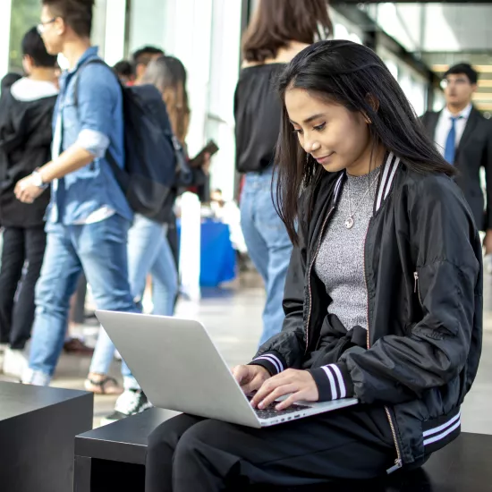 UTM student, Juriza, on her laptop