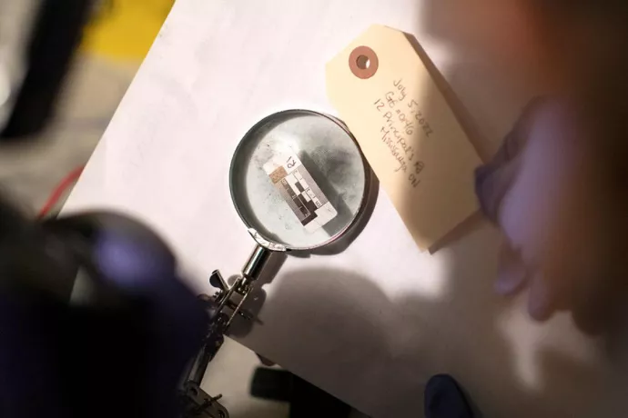Magnifying glass and thumbprint