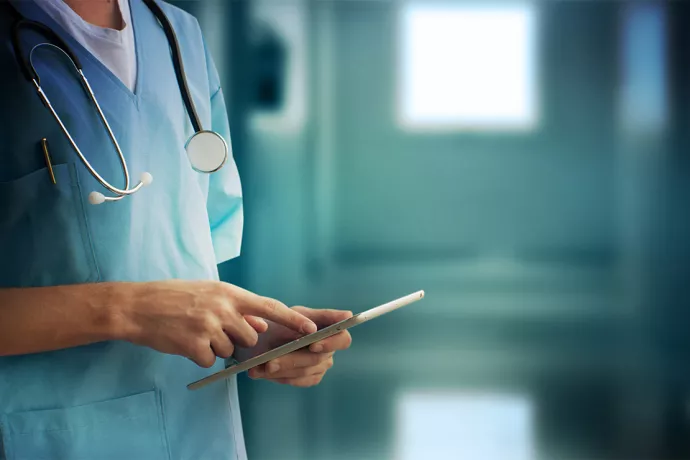 Doctor holding a digital tablet