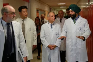  U of T's Scott Mabury (left) and Meric Gertler (centre) with federal innovation minister Navdeep Bains (Johnny Guatto photo)