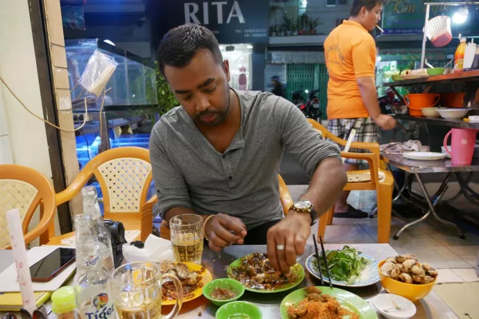Suresh Doss eating at a restaurant