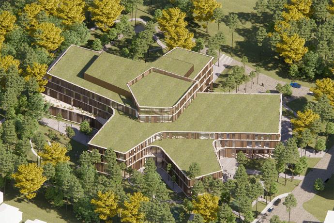 Aerial view of rendering of a tiered building with five wings coming out from centre of building, green roof on entire building