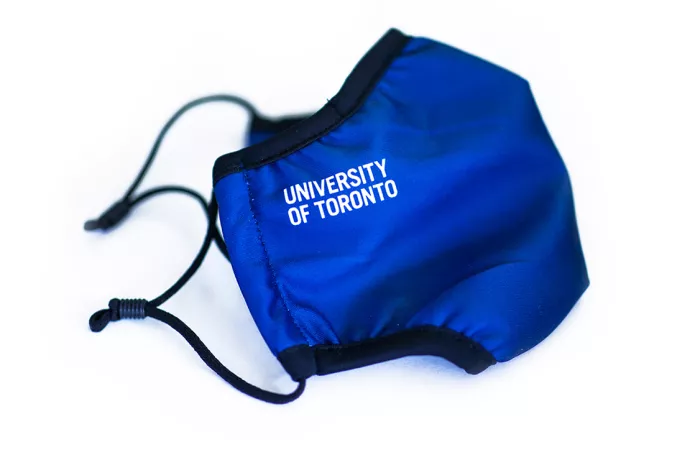 Picture of blue mask with University of Toronto written on it in white