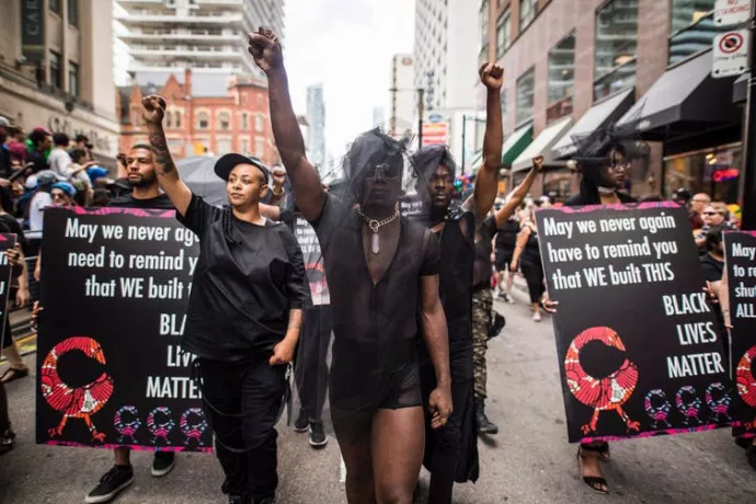 People from the Black Lives Matter movement march during the Pride parade in Toronto in June 2017