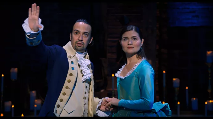 Lin Manuel-Miranda and Phillipa Soo onstage in the Disney production of Hamilton.