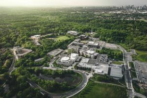 aerial photo of UTM campus surrounded by forest