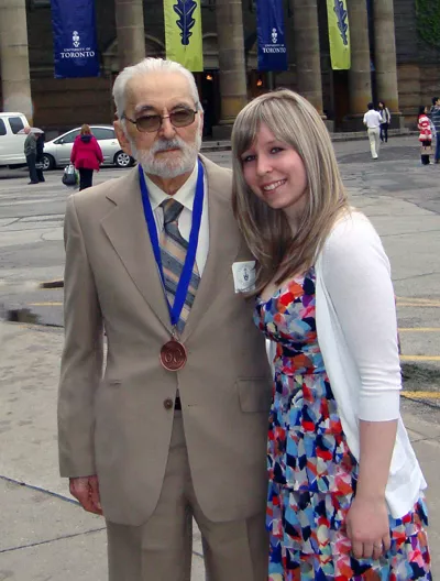 Kristin with her grandfather in front of Convocation Hall