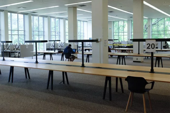 Empty desks in library