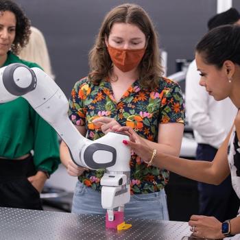 Students and visitors get a hands-on demonstration during the official opening of UTM's Undergraduate Robotics Teaching Laboratory on Sept. 7, 2022.