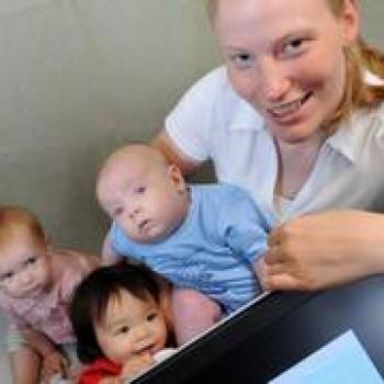 Image of infants with child studies professor