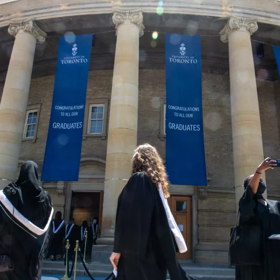 Grads line up outside Convocation Hall