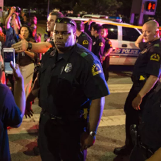 Police and protesters in Dallas on July 7, 2016, after one person is arrested 