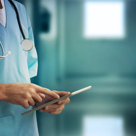 Doctor holding a digital tablet
